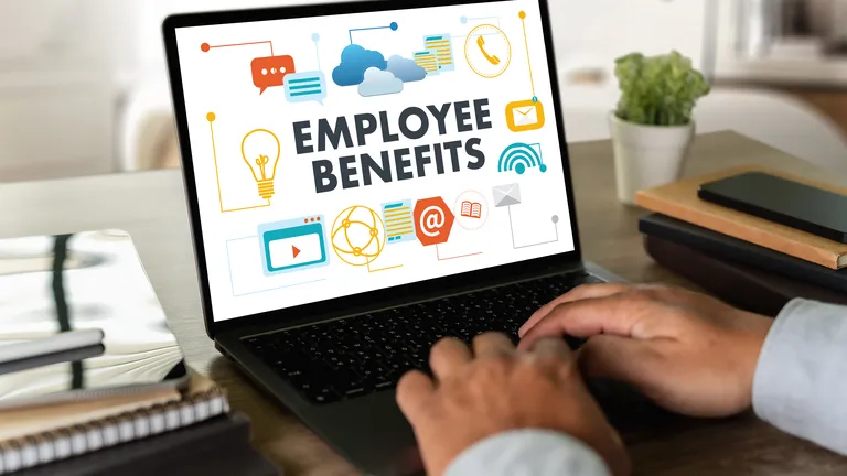 Laptop screen with the word Employee Benefits written on it.
