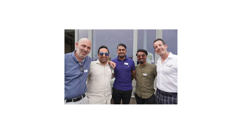 Group photo of two freelancers and three employees at Bosshard & Partner's 2024 summer event at Restaurant Waid.