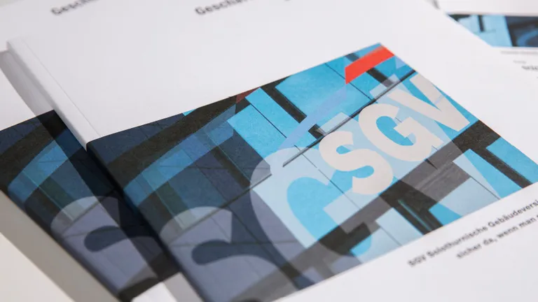 Two SGV brochures white with blue SGV picture.