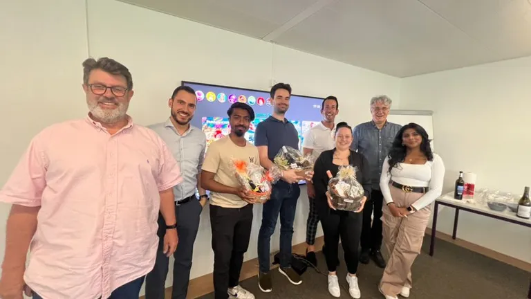 Group picture of Bosshard & Partner employees at an internal employee event.